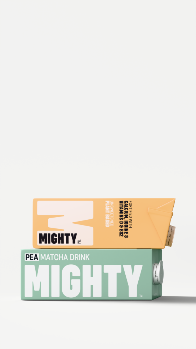A MIGHTY Pea Drink carton stacked on a Pea Matcha Drink carton